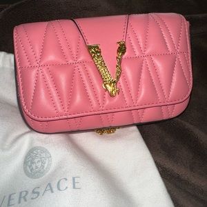 Like new authentic Versace pink & gold bag (small) no defects.